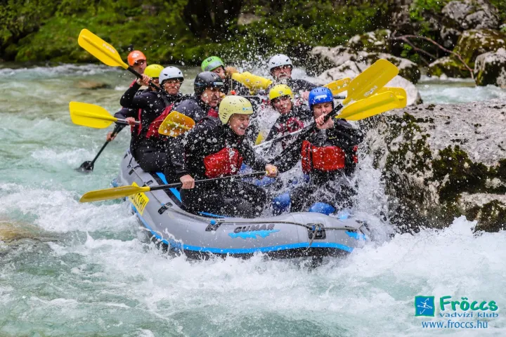 a group of people riding skis on top of a wave
