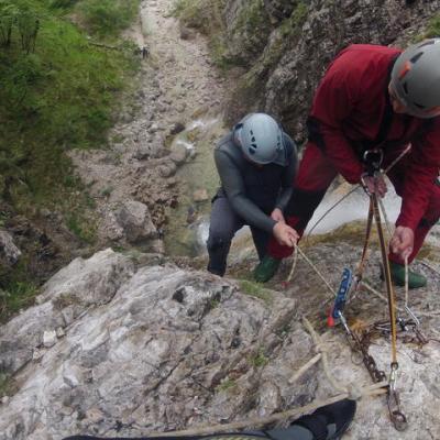 a man standing on a rocky hill