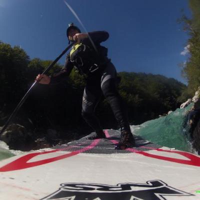 a man riding skis down a snow covered slope
