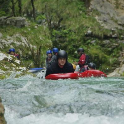 a man in a raft on the water