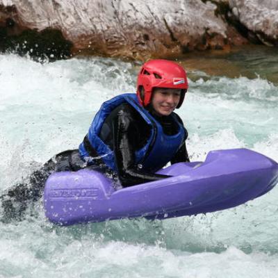 a man in a raft on the water