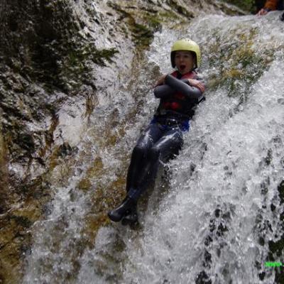 a man riding on the back of a waterfall