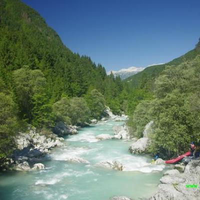 a group of people surrounded by water