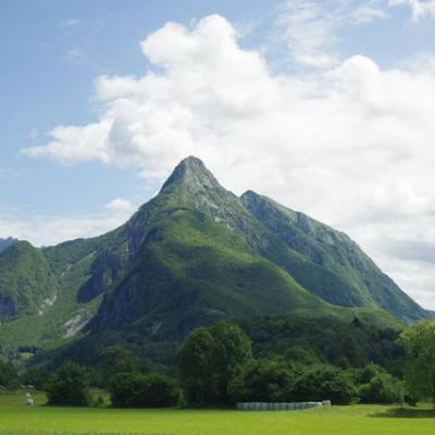 a large mountain in the background