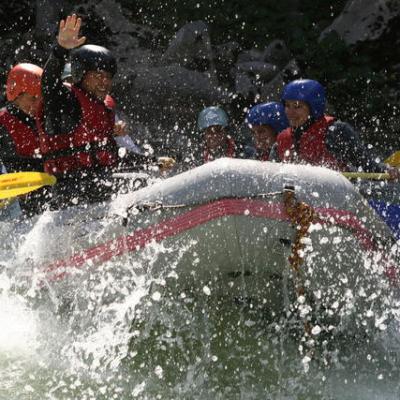 a man riding a wave on a surfboard in the water