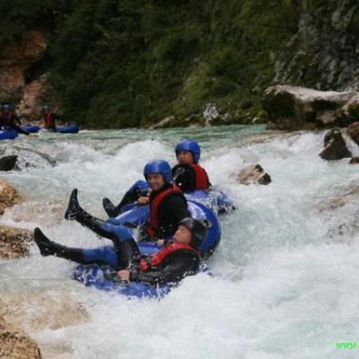 a group of people on a raft