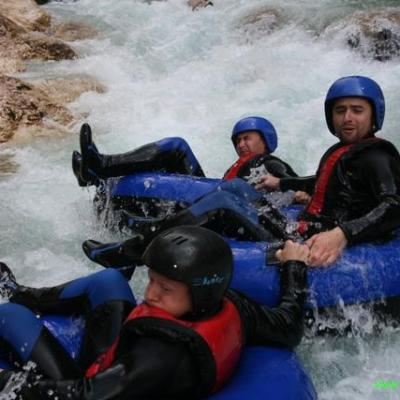 a person in a raft on the water