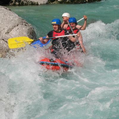 a man riding a wave on a surfboard in the water